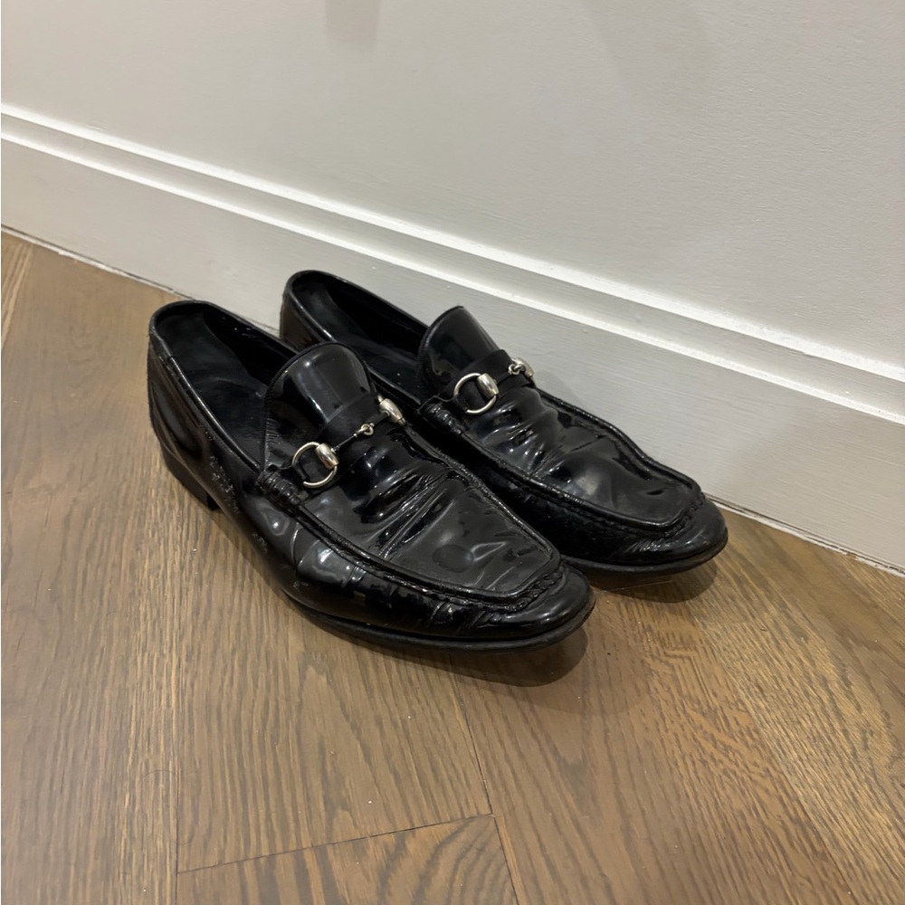 Sleek Black Leather Loafers with Metal Detail